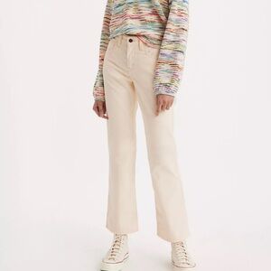 Fit flare wide leg corduroy pants in cream by Levi’s.